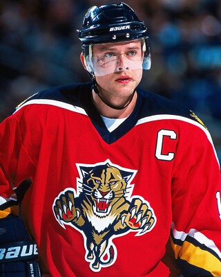 Pavel Bure as a Florida Panthers captain, wearing the original leaping-cat logo